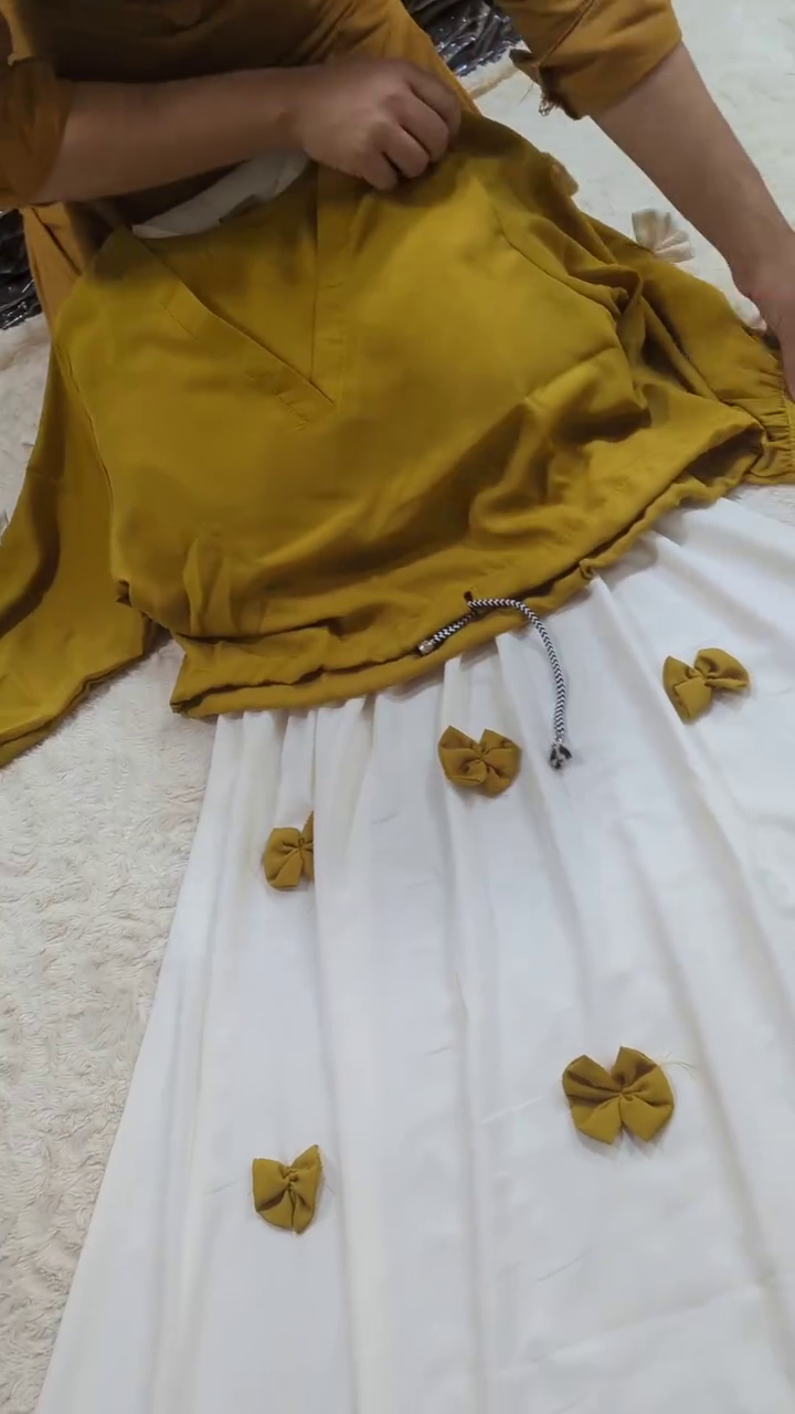 🌼 Mustard Charm Two-Piece Co-Ord Set – Bow Appliqué Top & Flowing White Skirt