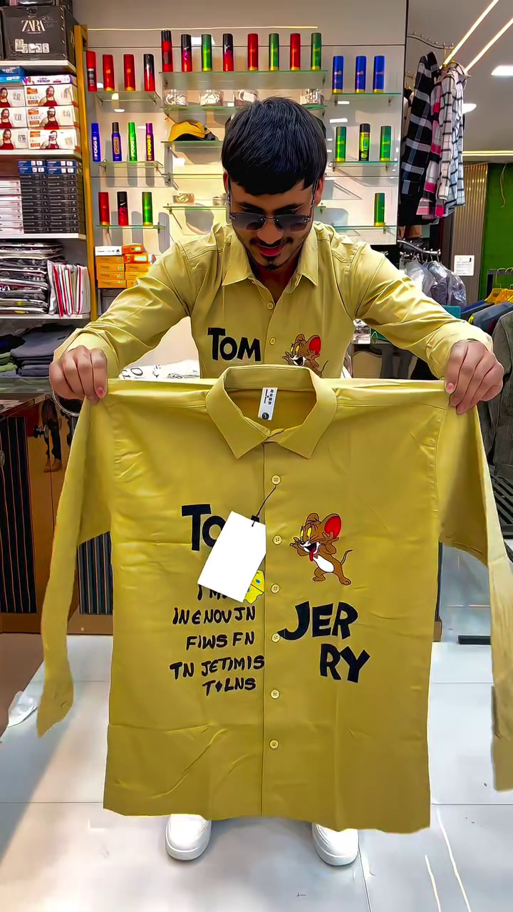 Trendy Yellow Graphic Shirt Featuring Iconic Cartoon Print Design