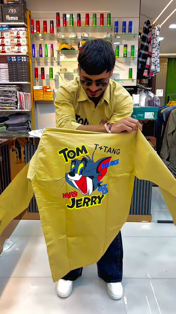 Trendy Yellow Graphic Shirt Featuring Iconic Cartoon Print Design