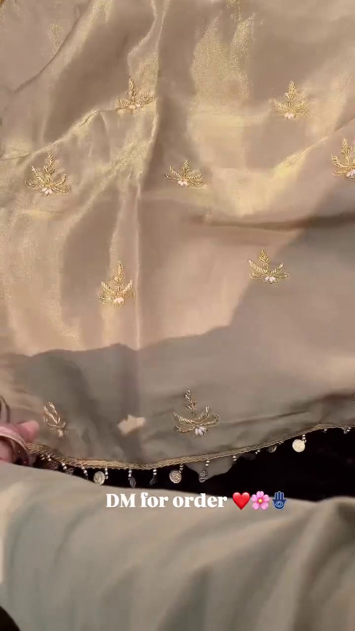 Luxurious Craftsmanship in Golden Embroidered Fabric