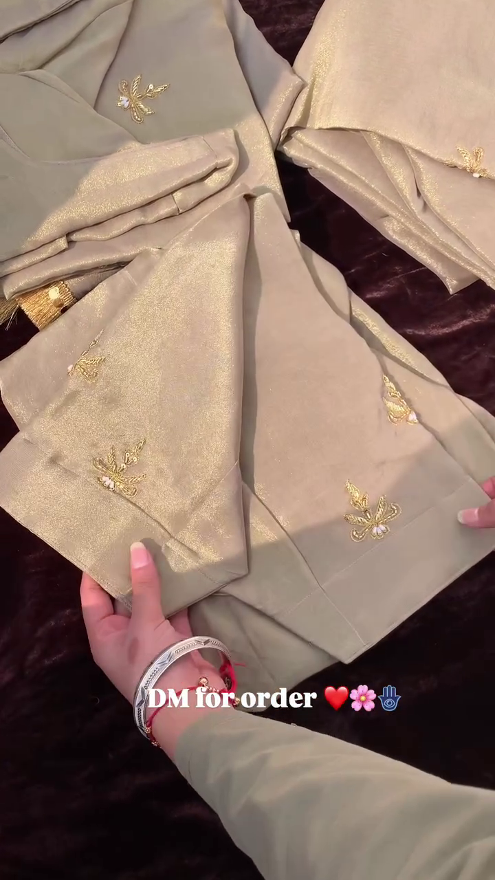 Luxurious Craftsmanship in Golden Embroidered Fabric