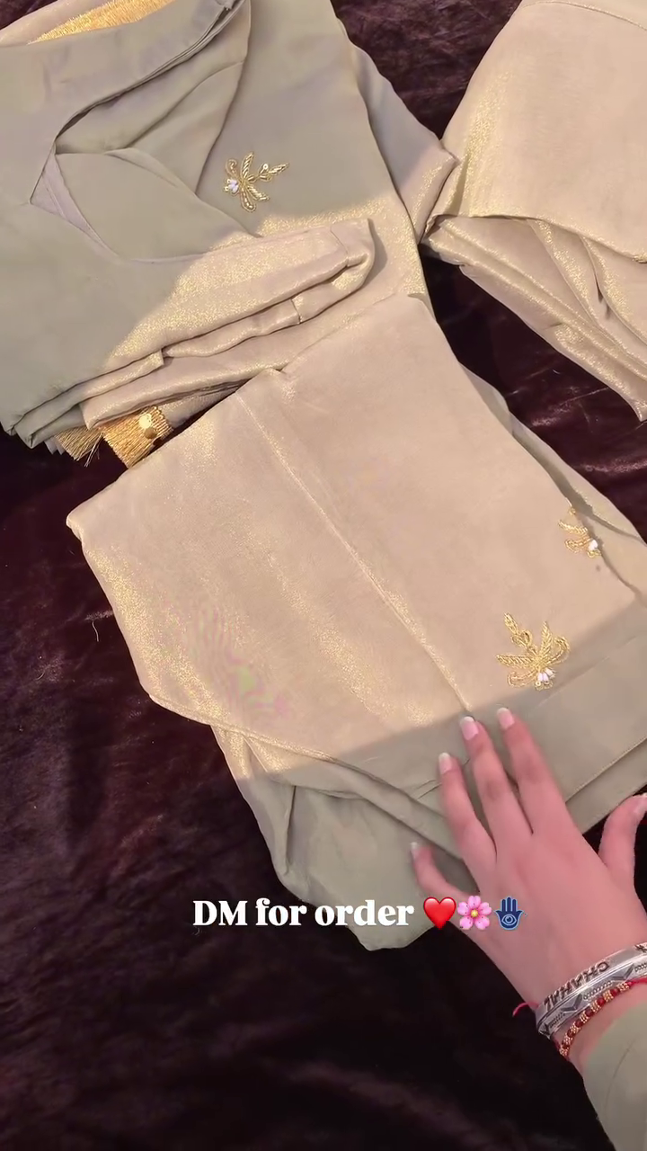 Luxurious Craftsmanship in Golden Embroidered Fabric