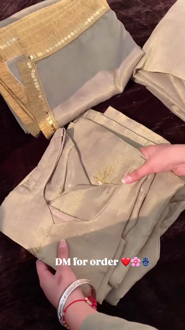 Luxurious Craftsmanship in Golden Embroidered Fabric