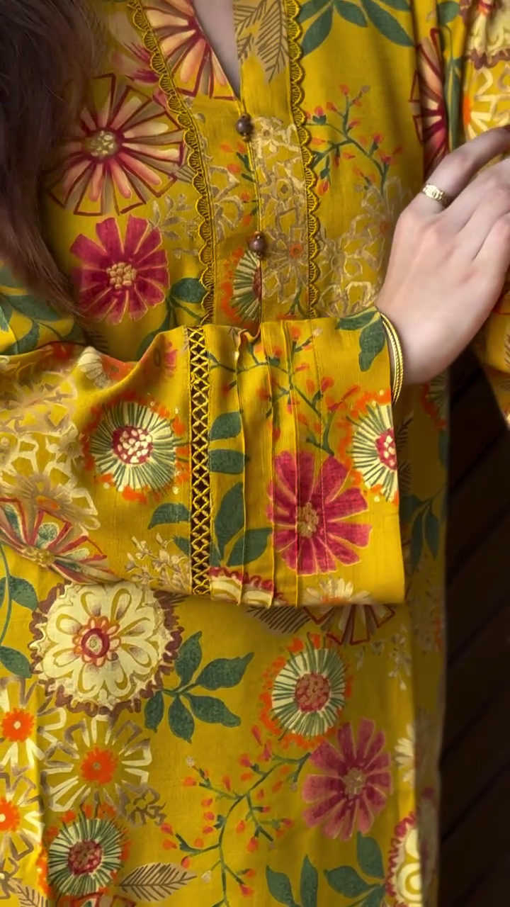 Radiant Mustard Floral Kurta with Elegant Lace Detailing and Statement Sleeves
