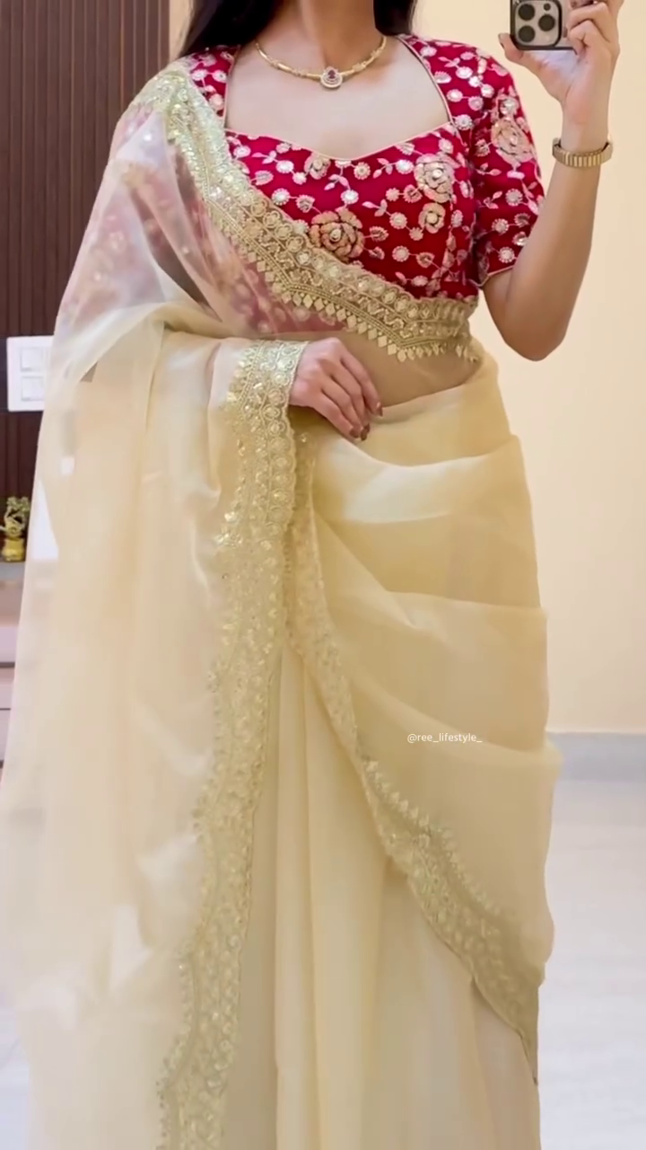 Elegant Cream Saree with Gold Border and Red Floral Blouse