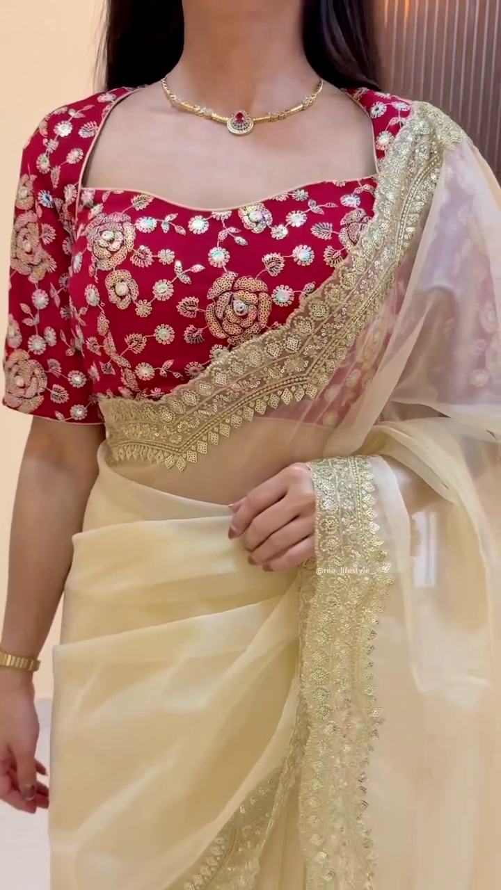 Elegant Cream Saree with Gold Border and Red Floral Blouse