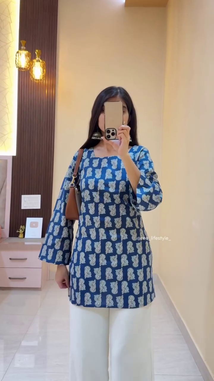 Elegant Brown Printed Kurti with Minimalist White Trousers