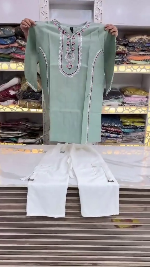 Elegant Mint Green Embroidered Kurta with Classic White Trousers