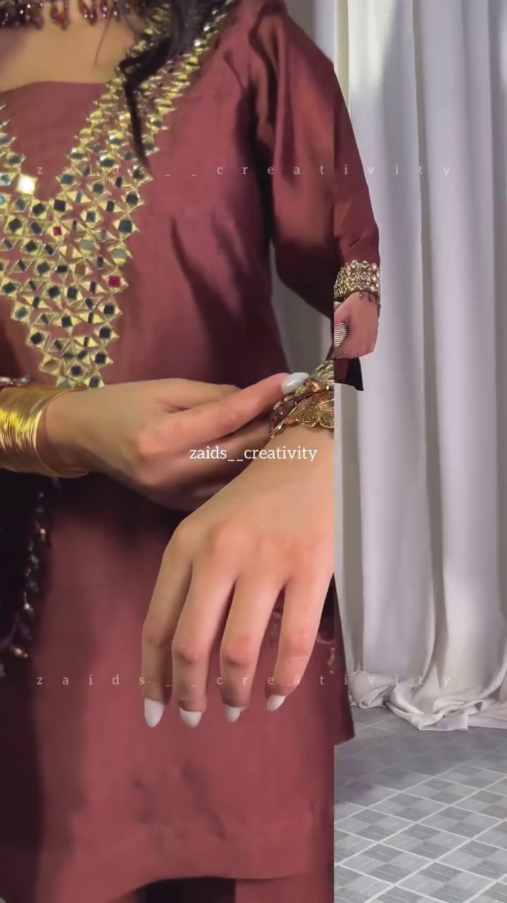 Luxurious Maroon Embellished Ensemble with Statement Gold Embroidery