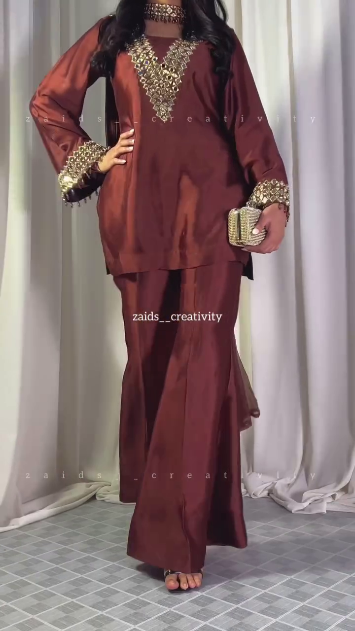 Luxurious Maroon Embellished Ensemble with Statement Gold Embroidery